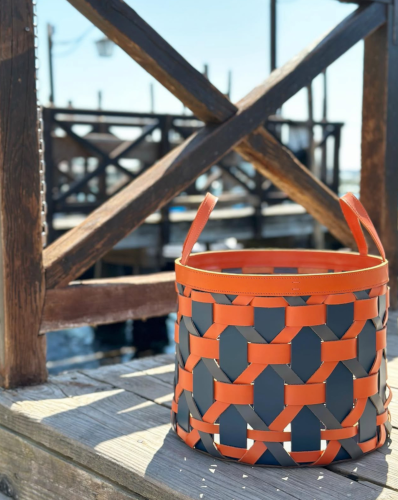 Photo set in Venice of woven leather basket by Giobagnara Venezia
